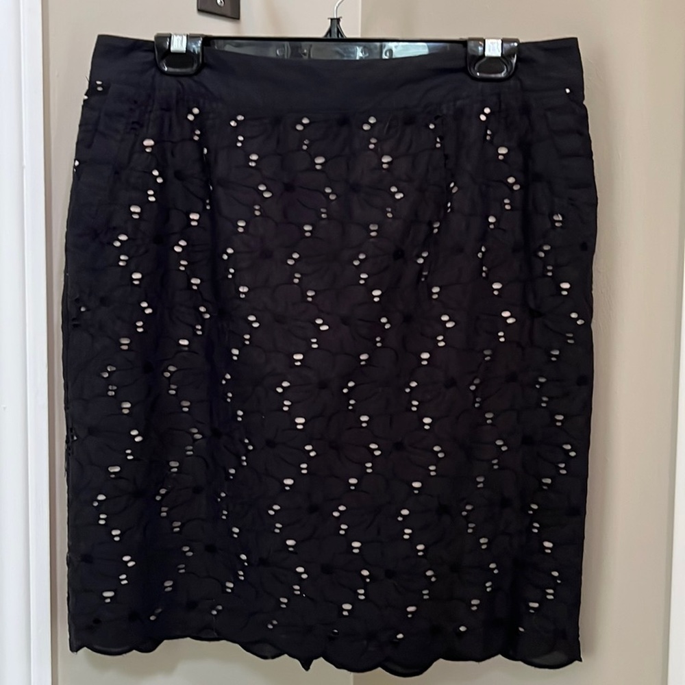 Skirt and top set. Black cotton with cream underlay.